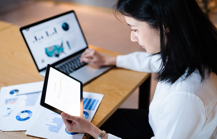 Woman at computer studying